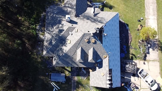 Aerial view of a roof replacement in progress on a home in Shreveport, LA.