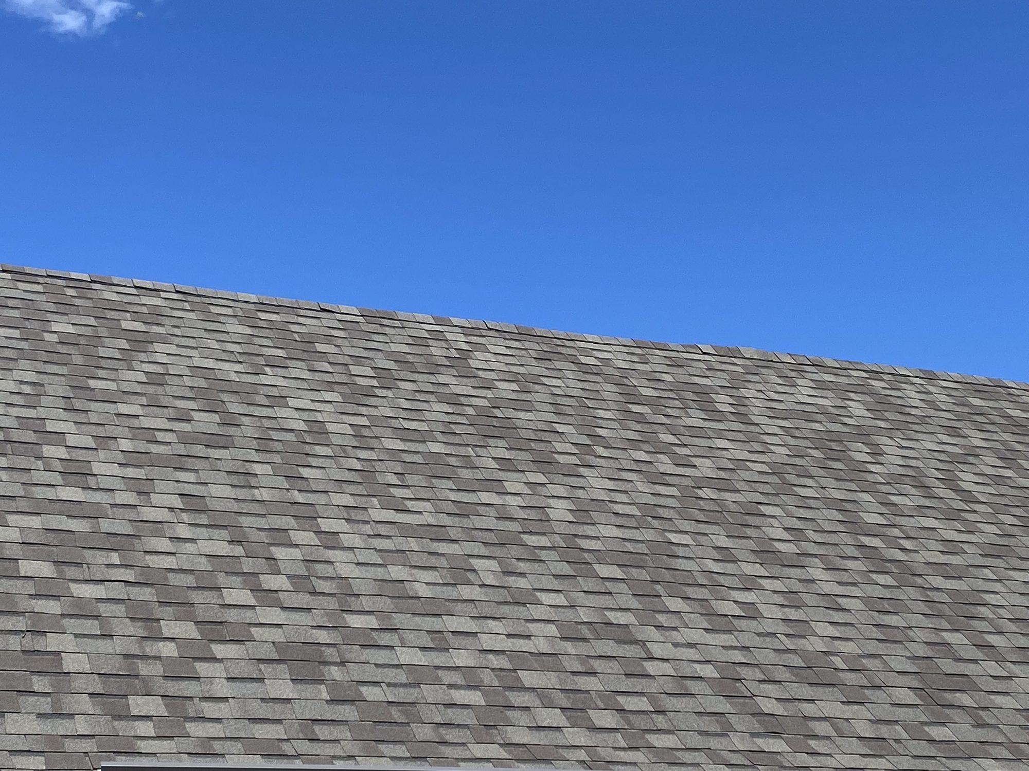 New architectural asphalt shingles installed by Blue Note Pros