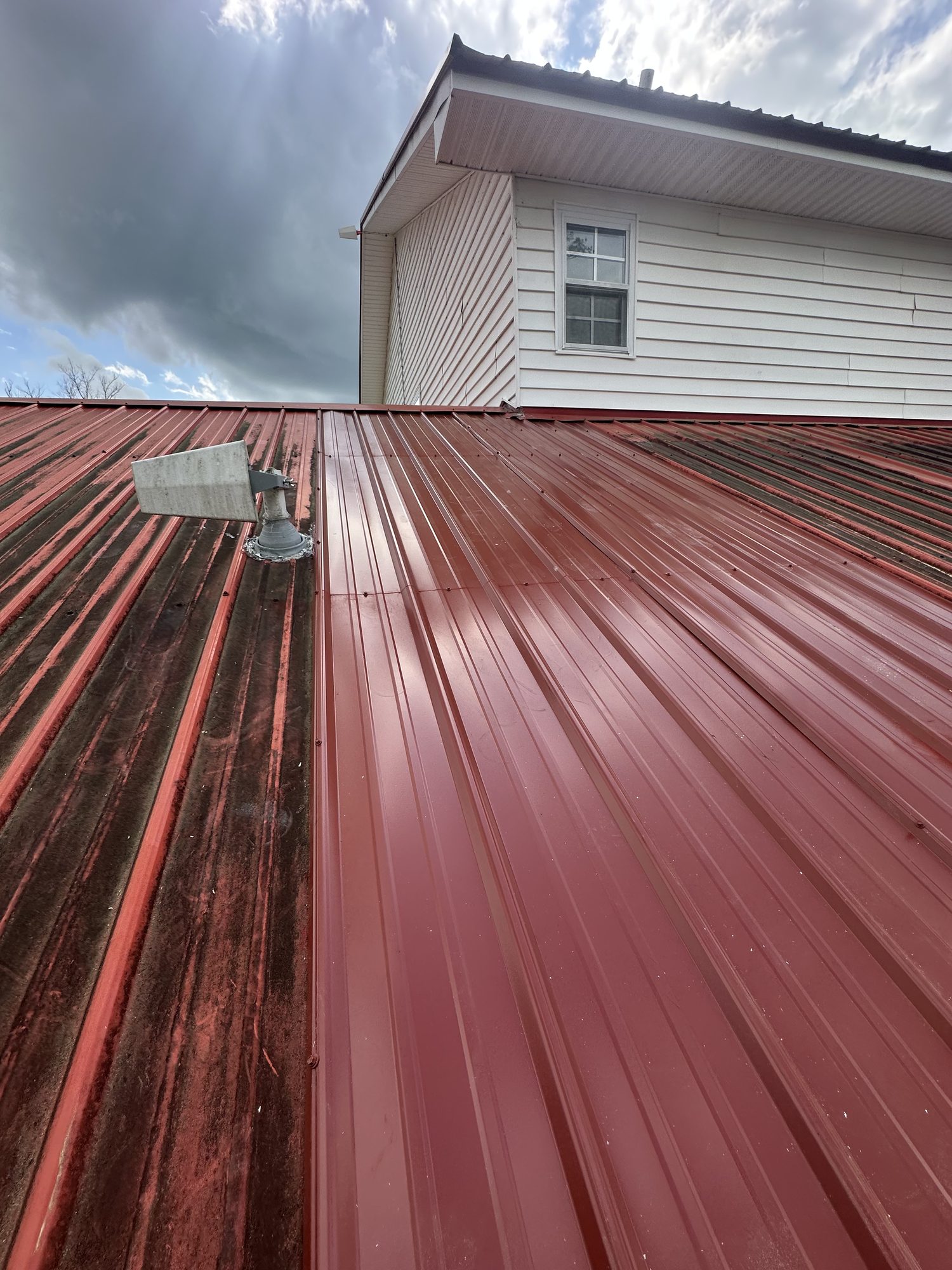 Screw-down metal roof repair by Blue Note Pros