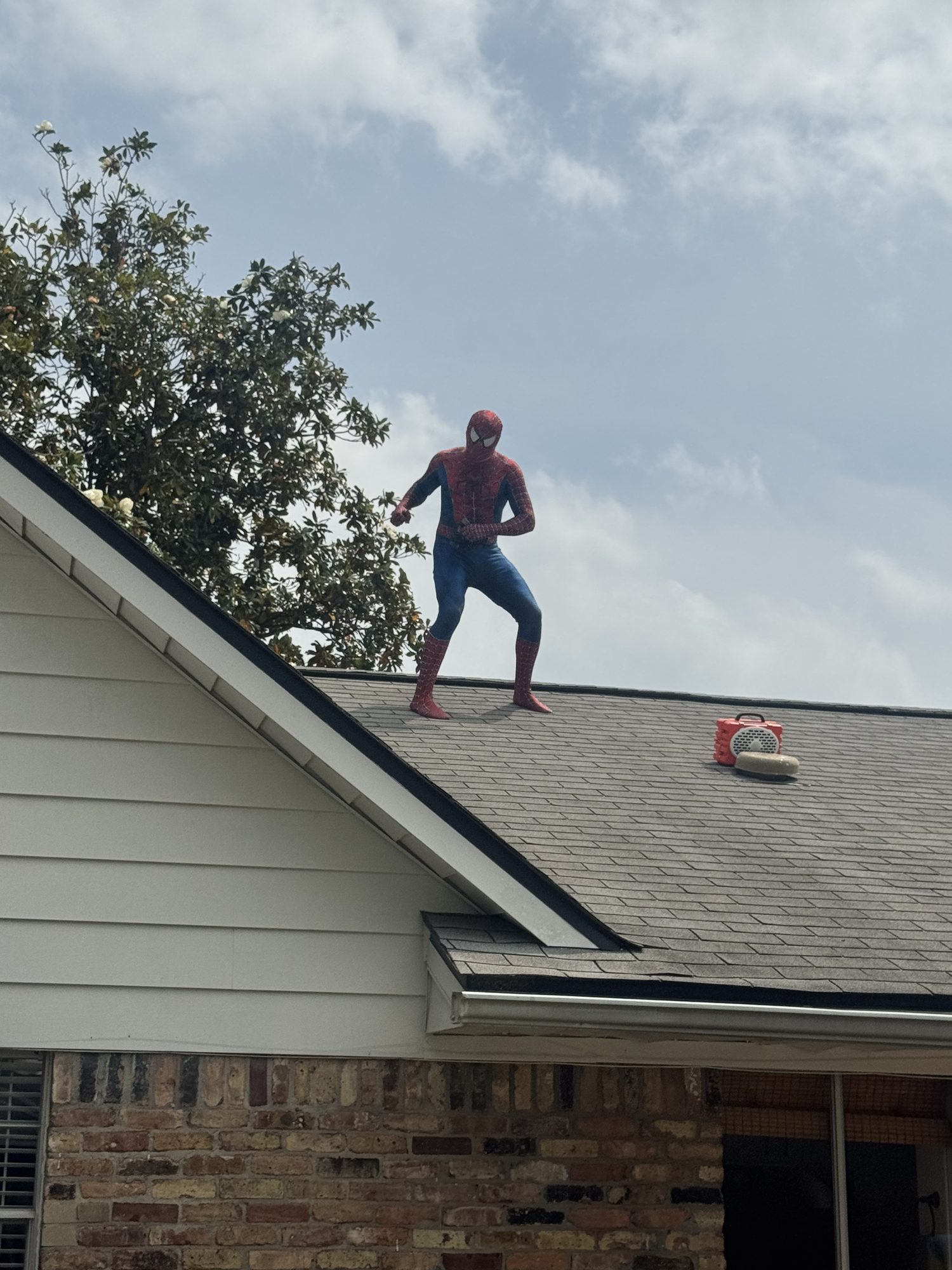 Blue Note Pros roofer inspecting a residential roof
