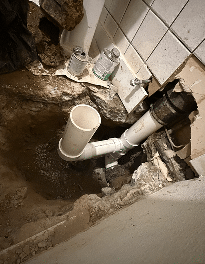 Plumber repairing an emergency plumbing issue